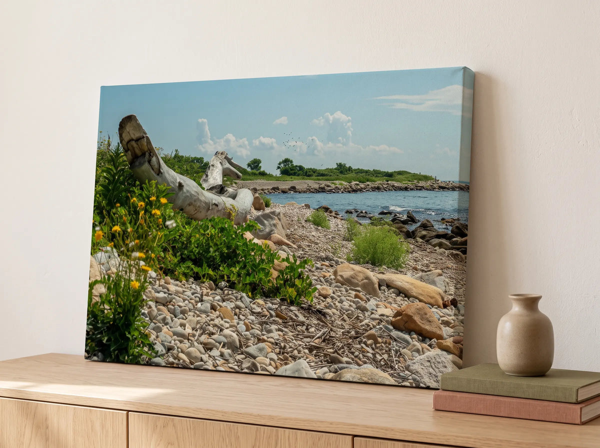 Canvas print of a rocky coastline on a sideboard