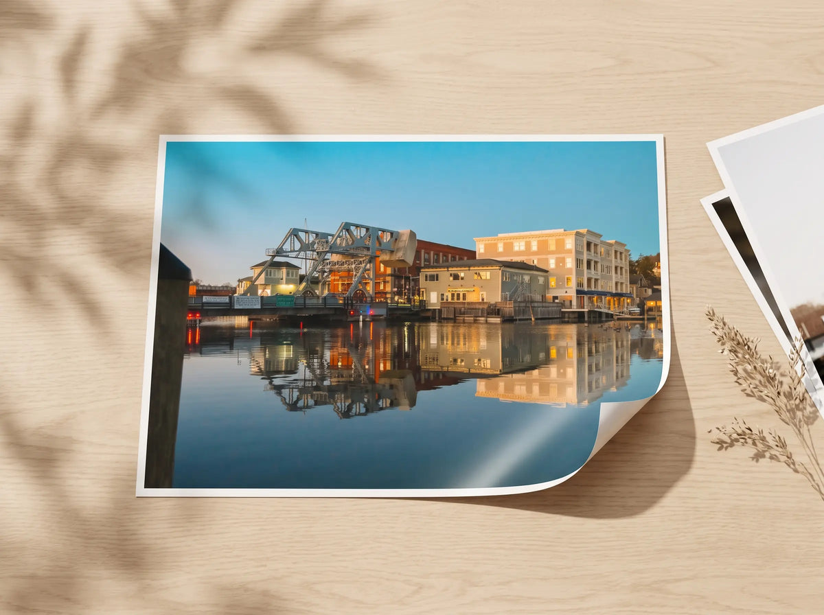 Paper print of a harbor reflection on a wooden table